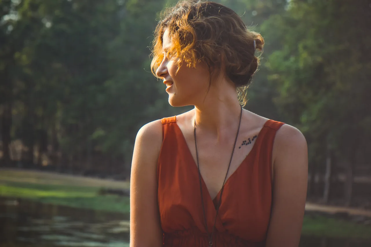 An adult enjoying a quiet moment outside, illustrating HSV Dating for Caregivers with Room for Romance