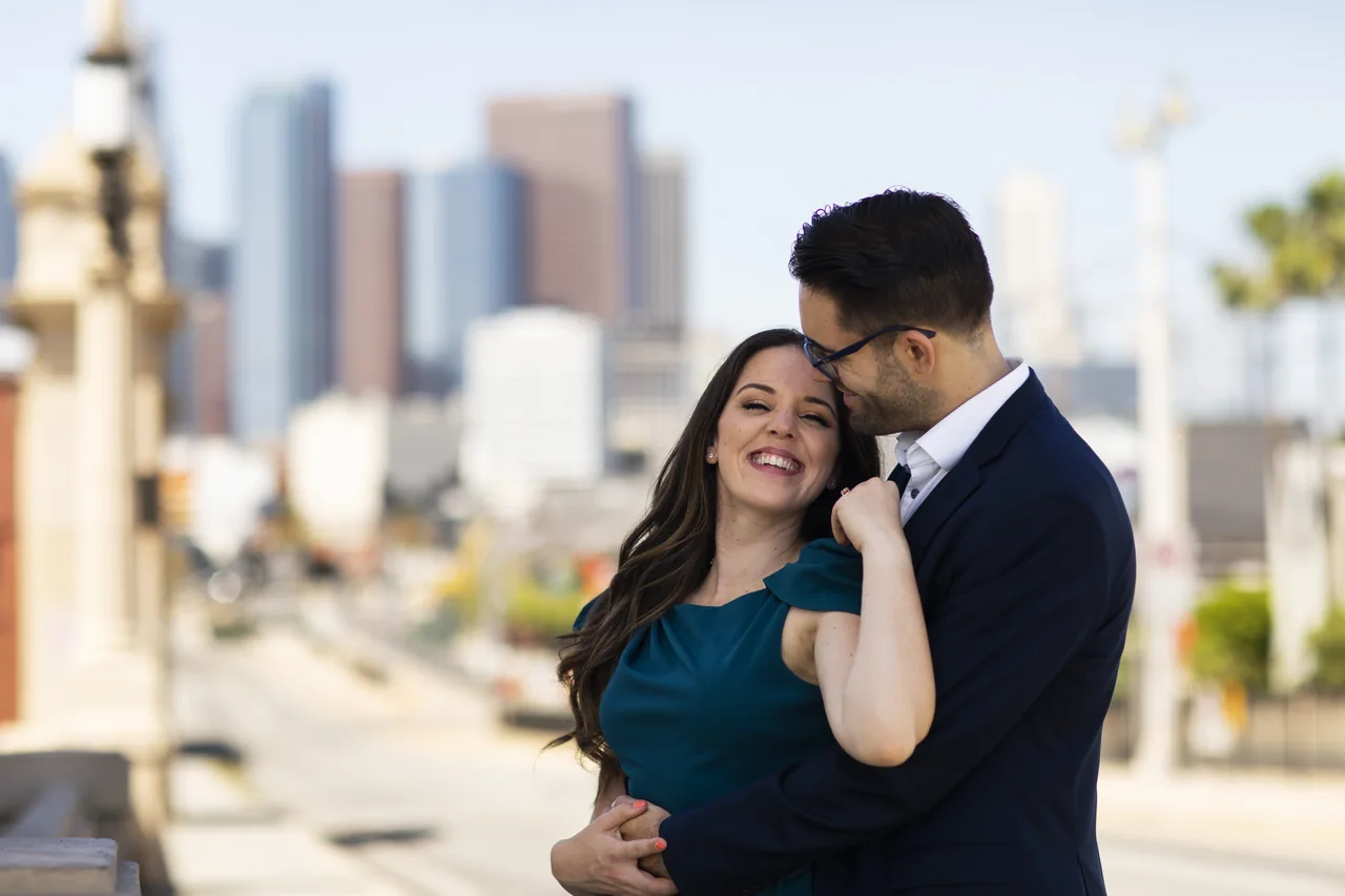 Two adults embracing in an urban setting, illustrating Herpes Singles in Big Cities with More Intentional Dates