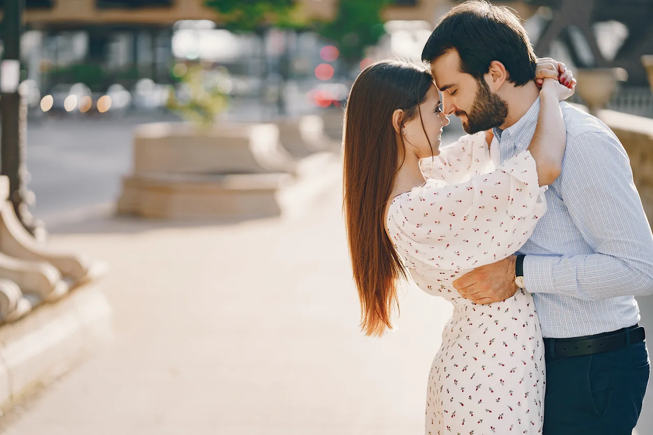 Two adults embracing beside the shore, illustrating Herpes Dating for Marriage: Find a Shared Direction